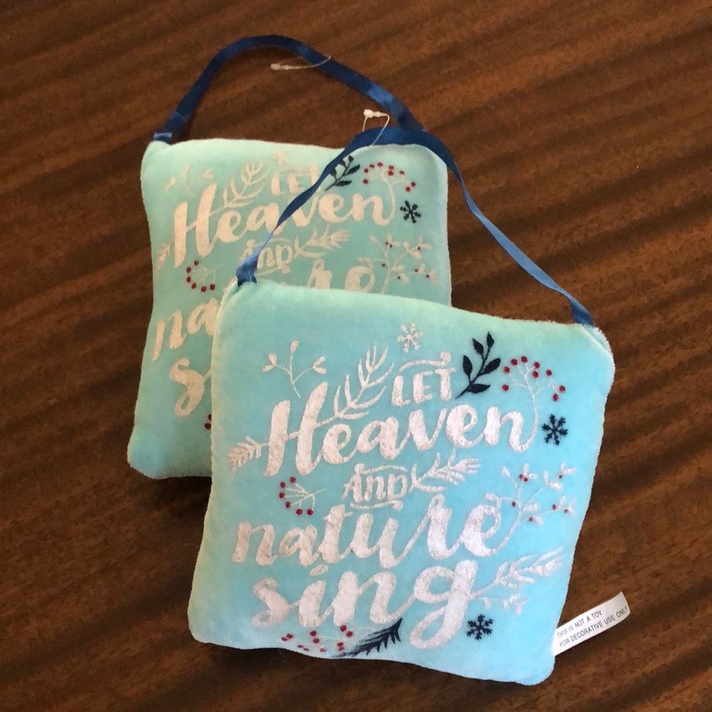 2  Christmas themed soft decorative puffy hanging pillows